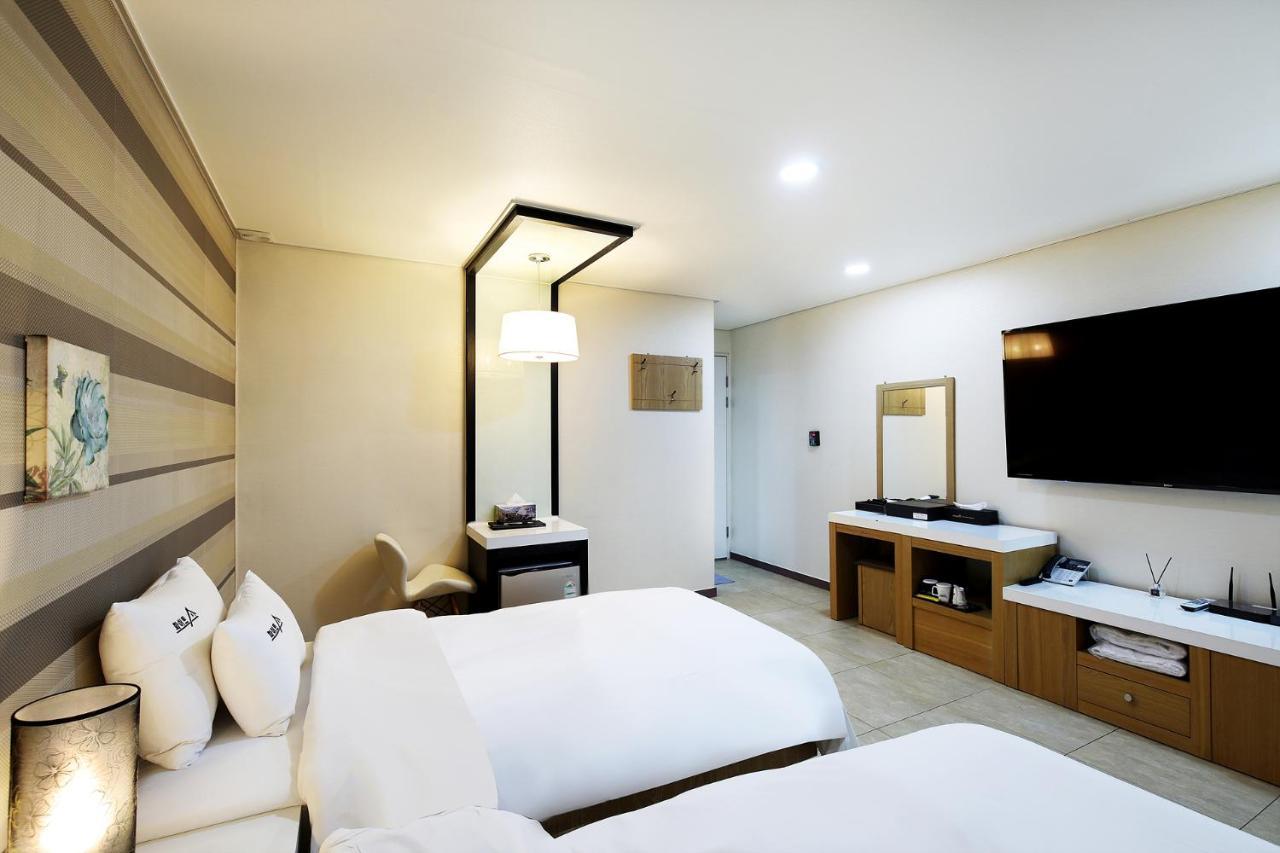 White Tourist Hotel Csondzsu Kültér fotó